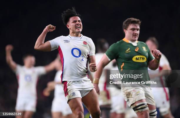 Marcus Smith of England celebrates after being awarded a penalty on the last play during the Autumn Nations Series match between England and South...