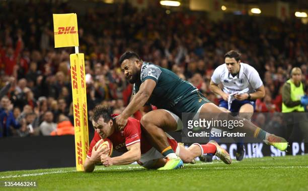 Wales hooker Ryan Elias dives over to score the first Wales try despite the attentions of Taniela Tupou of Australia during the Autumn Nations Series...