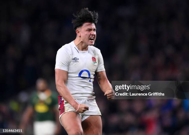 Marcus Smith of England celebrates after being awarded a penalty on the last play during the Autumn Nations Series match between England and South...