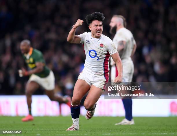 Marcus Smith of England celebrates after being awarded a penalty on the last play during the Autumn Nations Series match between England and South...