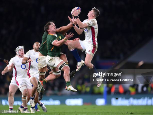 Freddie Steward of England jumps to claim the ball above Jasper Wiese of South Africa which leads to a penalty being awarded to England during the...