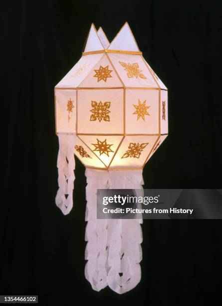 Yi Peng lantern made from mulberry paper, Yi Peng Festival, Chiang Mai, Northern Thailand. Loy Krathong is held annually on the full moon night of...