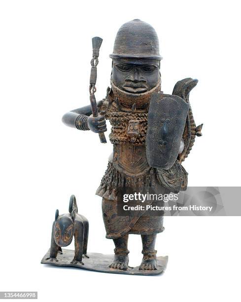 Bronze figurine of an Edo warrior with hunting leopard from the court of Benin, Nigeria, 16th century. The Benin Empire was a pre-colonial African...