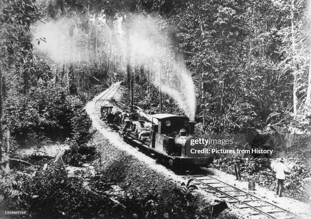 Malaysia: A steam engine travelling through the jungle in North Borneo, late 19th century.