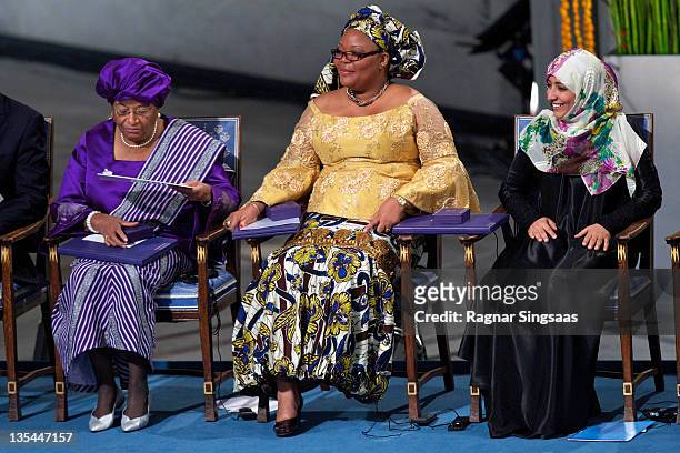 Joint winners Liberian President Ellen Johnson Sirleaf, Liberian activist Leymah Gbowee and Yemeni journalist and activist Tawakul Karman look on the...