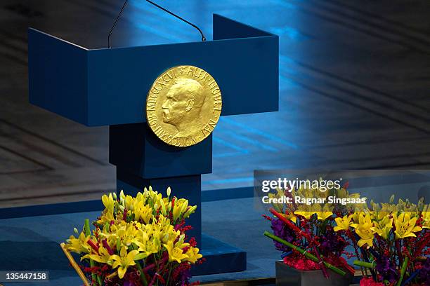 Plaque depicting Alfred Nobel adorns the wall during the Nobel Peace Prize Award Ceremony at Oslo City Hall on December 10, 2011 in Oslo, Norway.
