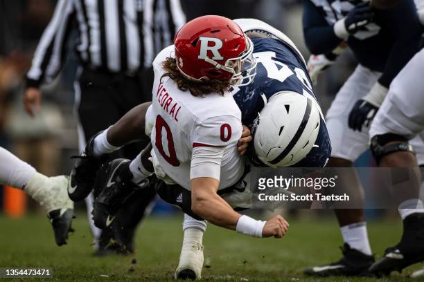 Derrick Tangelo of the Penn State Nittany Lions tackles Jovani Haskins of the Rutgers Scarlet Knights during the first half at Beaver Stadium on...