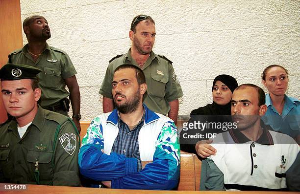 Abed Nassar Asida , Kifah Ajouri and Intisar Ajouri , the three relatives of terrorists slated for deportation to Gaza, listen to proceedings at...