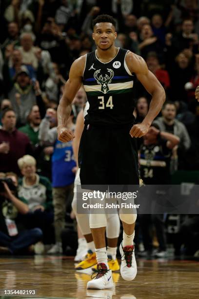 Giannis Antetokounmpo of the Milwaukee Bucks reacts after scoring during the second half of the game against the Oklahoma City Thunder at Fiserv...