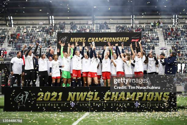 Washington Spirit celebrate with the championship trophy after defeating Chicago Red Stars to win the NWSL Championship held at Lynn Family Stadium...