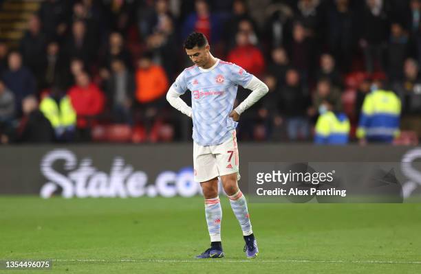Cristiano Ronaldo of Manchester United reacts after Watford score their fourth goal during the Premier League match between Watford and Manchester...