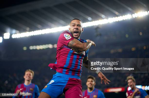 Memphis Depay of FC Barcelona celebrates after scoring his team's first goal during the La Liga Santander match between FC Barcelona and RCD Espanyol...