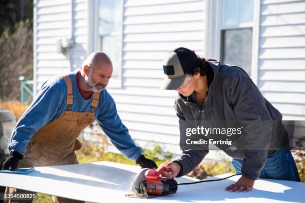 fixing up an old house - house repair stock pictures, royalty-free photos & images