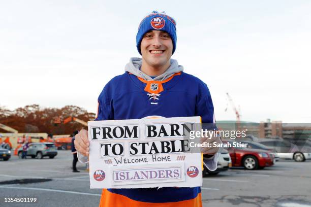 Fans gather in the parking lot prior to the game between the Calgary Flames and the New York Islanders at UBS Arena on November 20, 2021 in Elmont,...