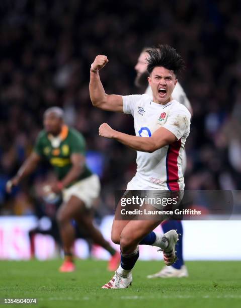 Marcus Smith of England celebrates after being awarded a penalty on the last play during the Autumn Nations Series match between England and South...