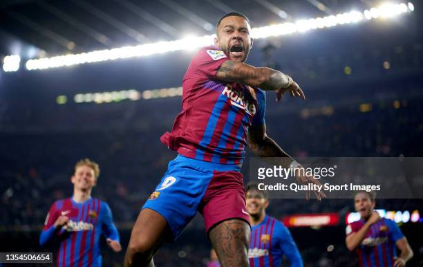 Memphis Depay of FC Barcelona celebrates after scoring his team's first goal during the La Liga Santander match between FC Barcelona and RCD Espanyol...