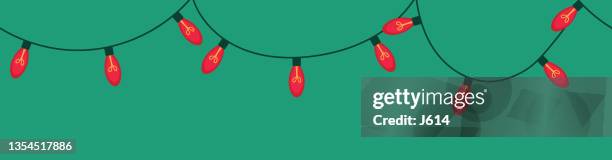 seamless string of red christmas lights - free christmas wallpaper stock illustrations