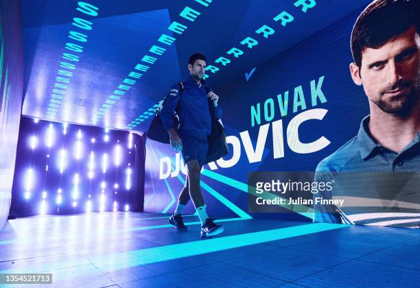 Novak Djokovic of Serbia walks towards the court ahead of his Round Robin Singles match against Cameron Norrie of Great Britain on Day Six of the...