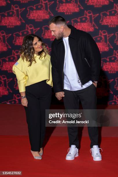 Ines Reg and Kevin Debonne attends the 22nd NRJ Music Awards on November 20, 2021 in Cannes, France.