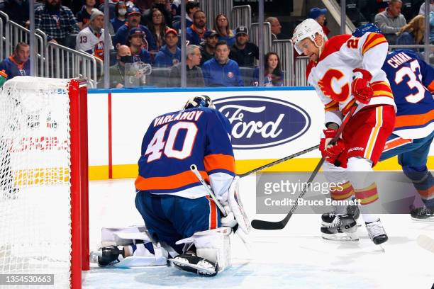 Semyon Varlamov of the New York Islanders makes the first period save on Trevor Lewis of the Calgary Flames at the UBS Arena on November 20, 2021 in...