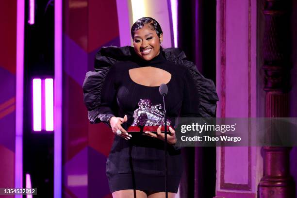 Jazmine Sullivan accepts an award onstage during the 2021 Soul Train Awards at The Apollo Theater on November 20, 2021 in New York City.