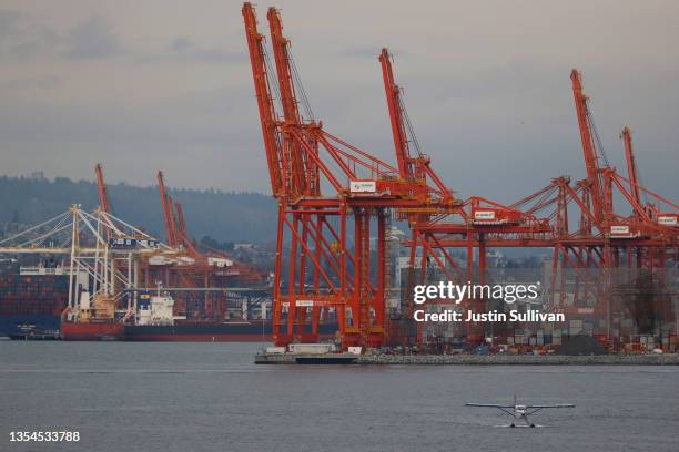 Seaplane lands on the Vancouver Harbour near the Port of Vancouver on November 20, 2021 in Vancouver, British Columbia. The Canadian province of...