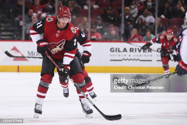 Loui Eriksson of the Arizona Coyotes skates with the puck during the NHL game at Gila River Arena on November 18, 2021 in Glendale, Arizona. The Blue...