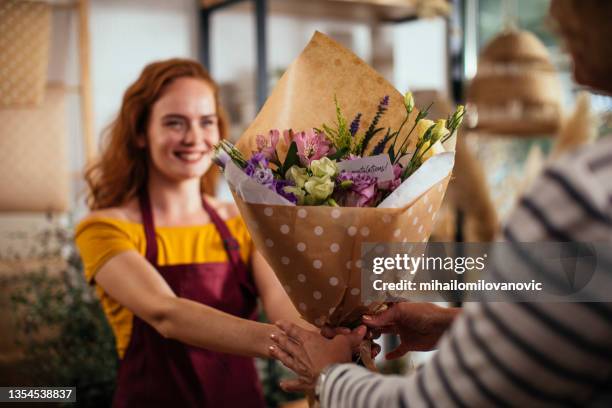 thanks for visiting us - buying flowers stock pictures, royalty-free photos & images