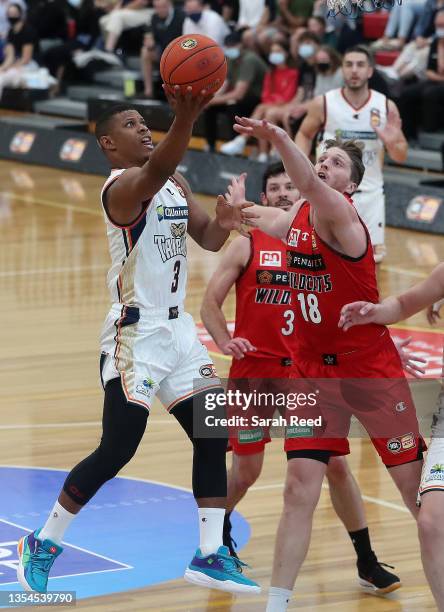 Scott Machado of the Cairns Taipans and Matthew Hodgson of the Perth Wildcats during the NBL Blitz match between Perth Wildcats and Cairns Taipans at...