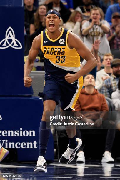 Myles Turner of the Indiana Pacers reacts after a dunk in the game against the New Orleans Pelicans during the third quarter at Gainbridge Fieldhouse...