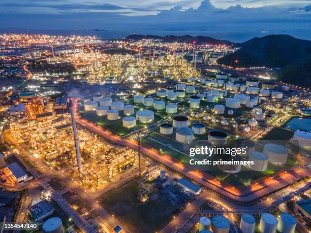 top view sustainable natural gas powerplant and oil crude combined cycle power plant and turbine generator of industry zone working at night - carbon cycle stock pictures, royalty-free photos & images