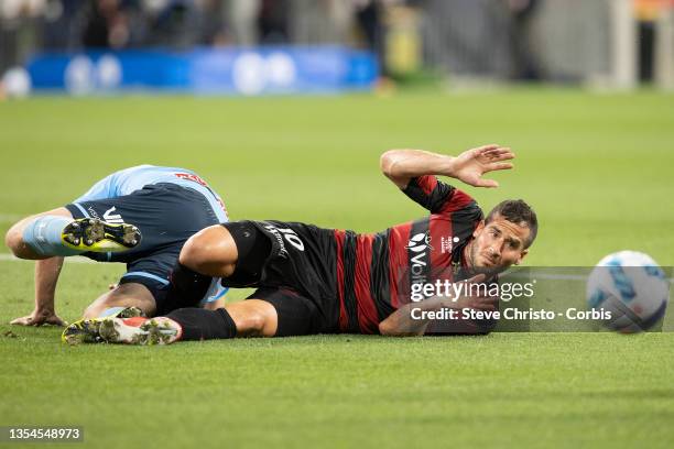 Tomer Hemed of the Wanderers collides with Sydney FC's captain Alexander Wilkinson during the A-League match between Western Sydney Wanderers and...