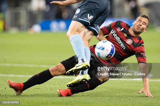Tomer Hemed of the Wanderers collides with Sydney FC's captain Alexander Wilkinson during the A-League match between Western Sydney Wanderers and...