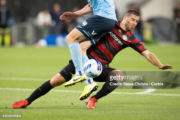 Tomer Hemed of the Wanderers collides with Sydney FC's captain Alexander Wilkinson during the A-League match between Western Sydney Wanderers and...