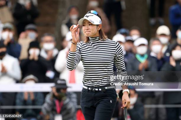 Erika Hara of Japan shows emotion after holing the winning putt on the 18th green during the final round of the Daio Paper Elleair Ladies at the...