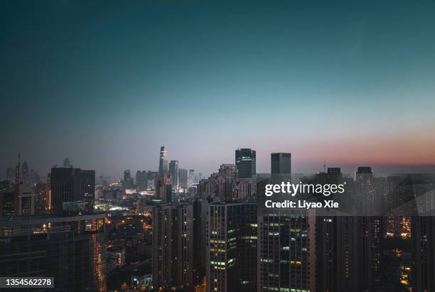aerial view of city night - empty office window stock pictures, royalty-free photos & images