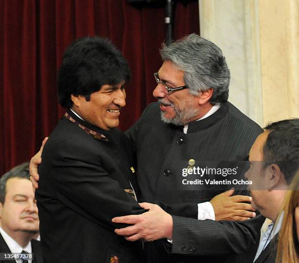 The Presidents of Paraguay, Fernando Lugo and Bolivia, Evo Morales, witness the assumption of Cristina Fernandez de Kirchner as constitutional...