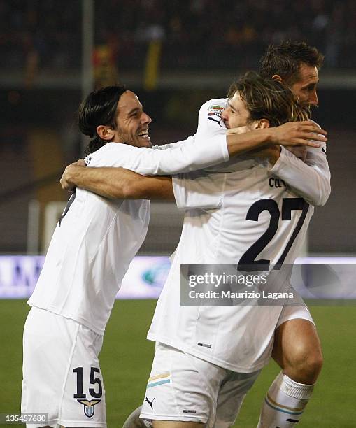 Lorik Cana of Lazio celebrates with team-mates Alvaro Gonzalez and Miroslav Klose after scoring his team's second goal during the Serie A match...