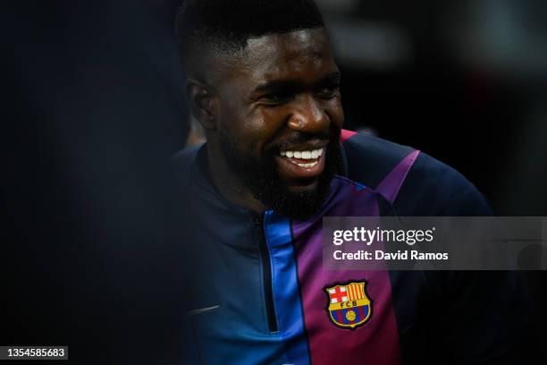 Samuel Umtiti of FC Barcelona looks on during the La Liga Santander match between FC Barcelona and RCD Espanyol at Camp Nou on November 20, 2021 in...