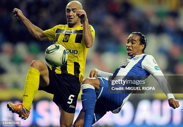 Porto's Uruguayan defender Alvaro Pereira vies with SC Beira Mar's defender Hugo Vieira during a Portuguese super league football match Beiramar vs...