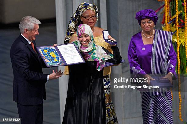 Chairman of the Nobel Committee Thorbjoern Jagland , joint winner Liberian activist Leymah Gbowee and joint winner Liberian President Ellen Johnson...