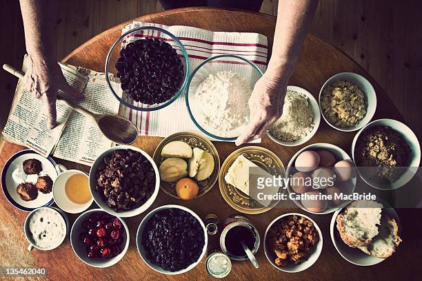 making christmas pudding - catherine macbride stock pictures, royalty-free photos & images