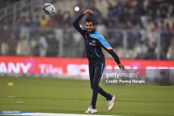 Yuzvendra Chahal of India warms up ahead of the Third T20 International match between India and New Zealand at Eden Gardens on November 21, 2021 in...