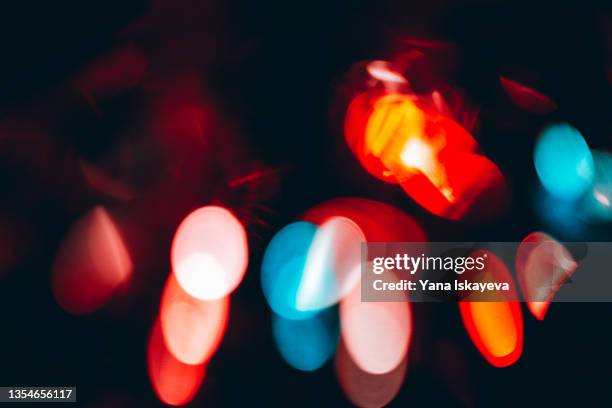 abstract neon light hits, defocused on isolated black background - lens flare isolated stock pictures, royalty-free photos & images