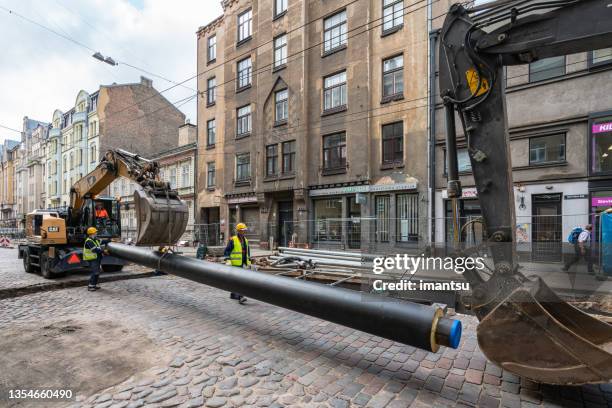 heat pipe replacement works - district heating stock pictures, royalty-free photos & images