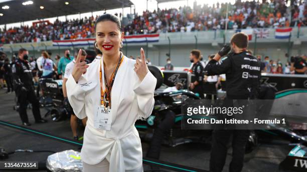 Brazilian model Adriana Lima poses for a photo on the grid before the F1 Grand Prix of Qatar at Losail International Circuit on November 21, 2021 in...