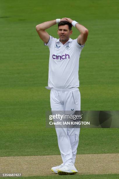 England's James Anderson reacts while bowling on day three of the second Ashes cricket Test match between England and Australia at Lord's cricket...