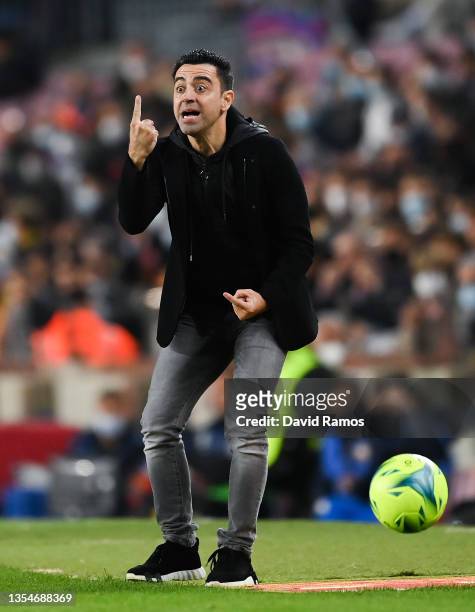 Head coach Xavi Hernandez of FC Barcelona directs his players during the La Liga Santander match between FC Barcelona and RCD Espanyol at Camp Nou on...