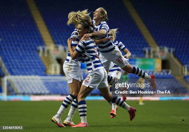 Emma Harries of Reading celebrates with teammates after scoring their team's second goal during the Barclays FA Women's Super League match between...