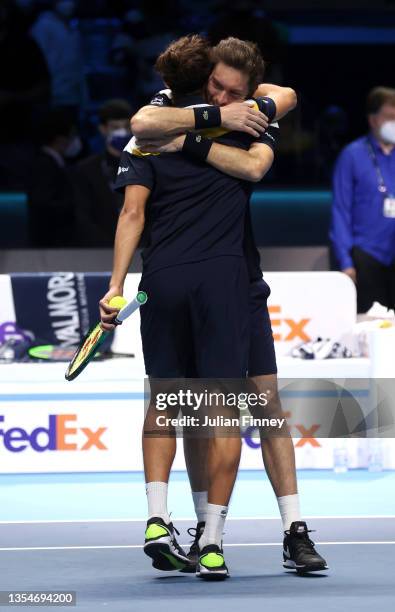 Nicolas Mahut and Pierre-Hugues Herbert of France celebrate victory in the Men's Doubles final match between Pierre-Hugues Herbert and Nicolas Mahut...